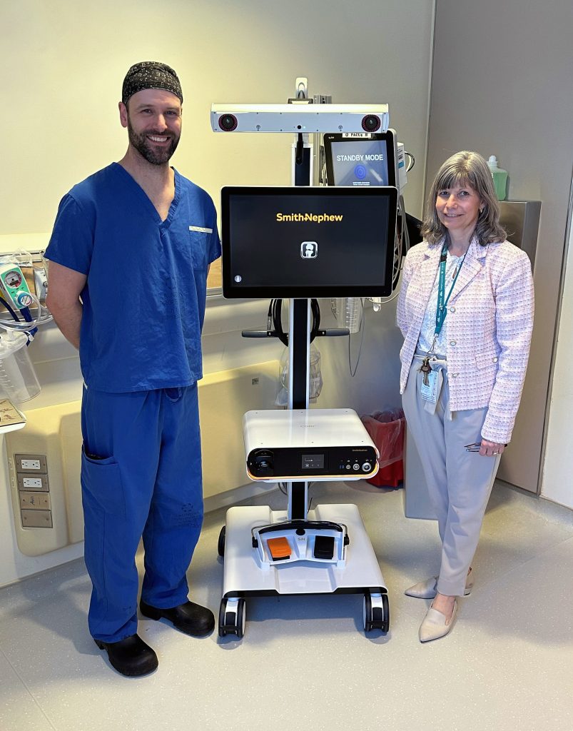 Pictured: Dr Stephen Petis, Orthopedic Surgeon with Leslie Slabon, Director or Surgical Services with the CORI Robot