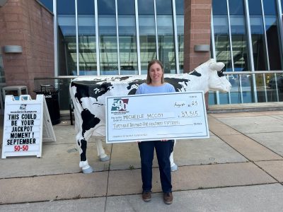 GP winner 2 photo of Michelle holding cheque